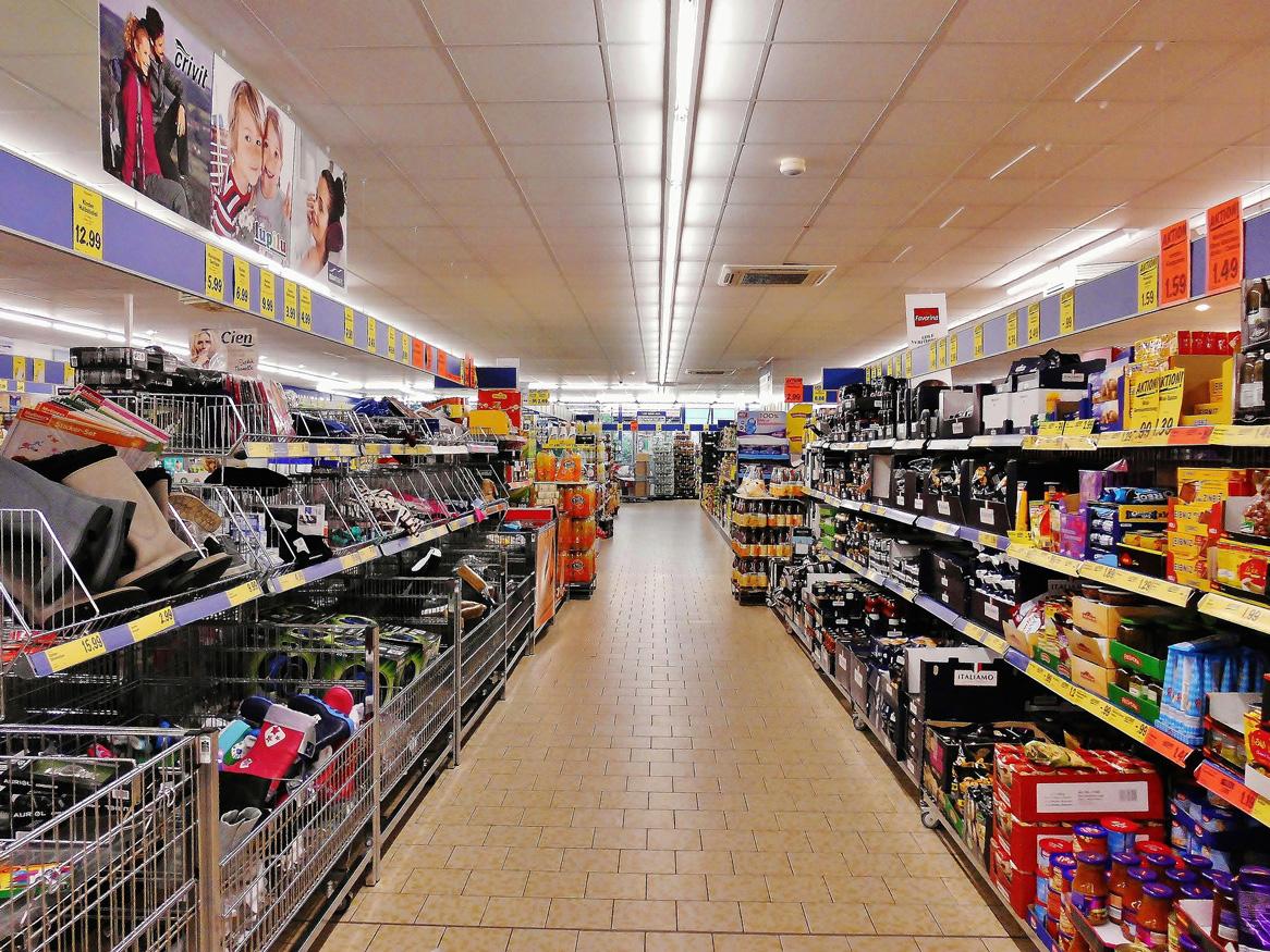 Image of supermarket shelves covered in junk food.